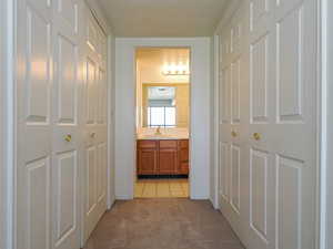 Corridor with double closets.