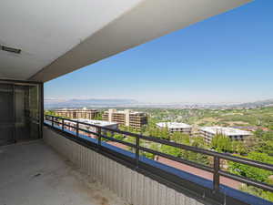 Balcony with a mountain view and a city view