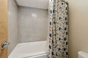 Full bathroom with toilet