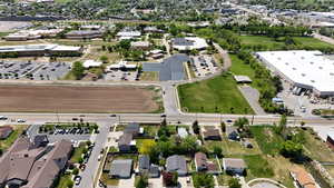 Aerial overview of property's location with nearby suburban area