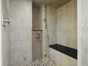 Primary bedroom bath shower with built in bench