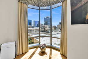 Detailed view of city skyline and wood finished floors