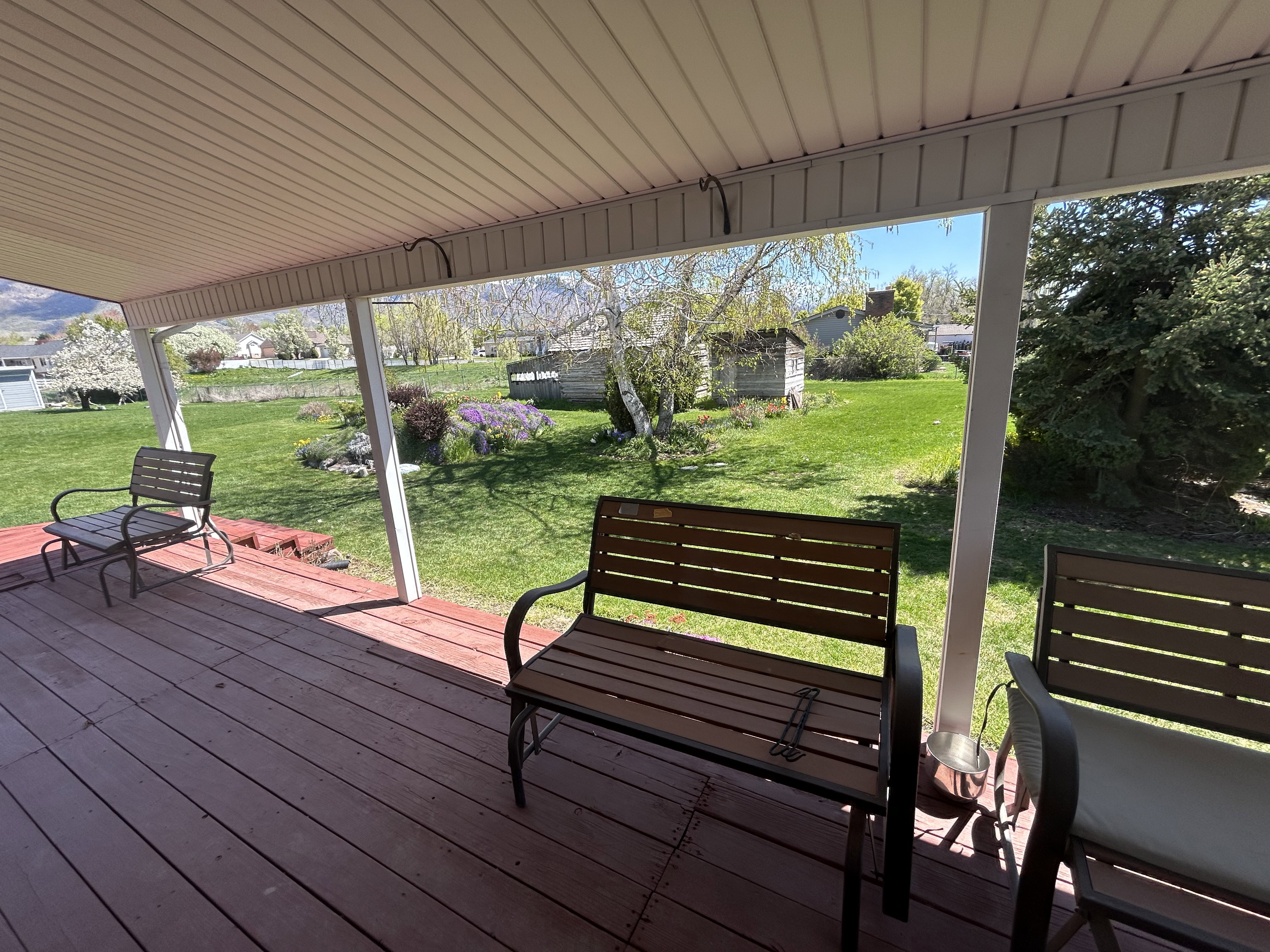 Wooden deck featuring a yard