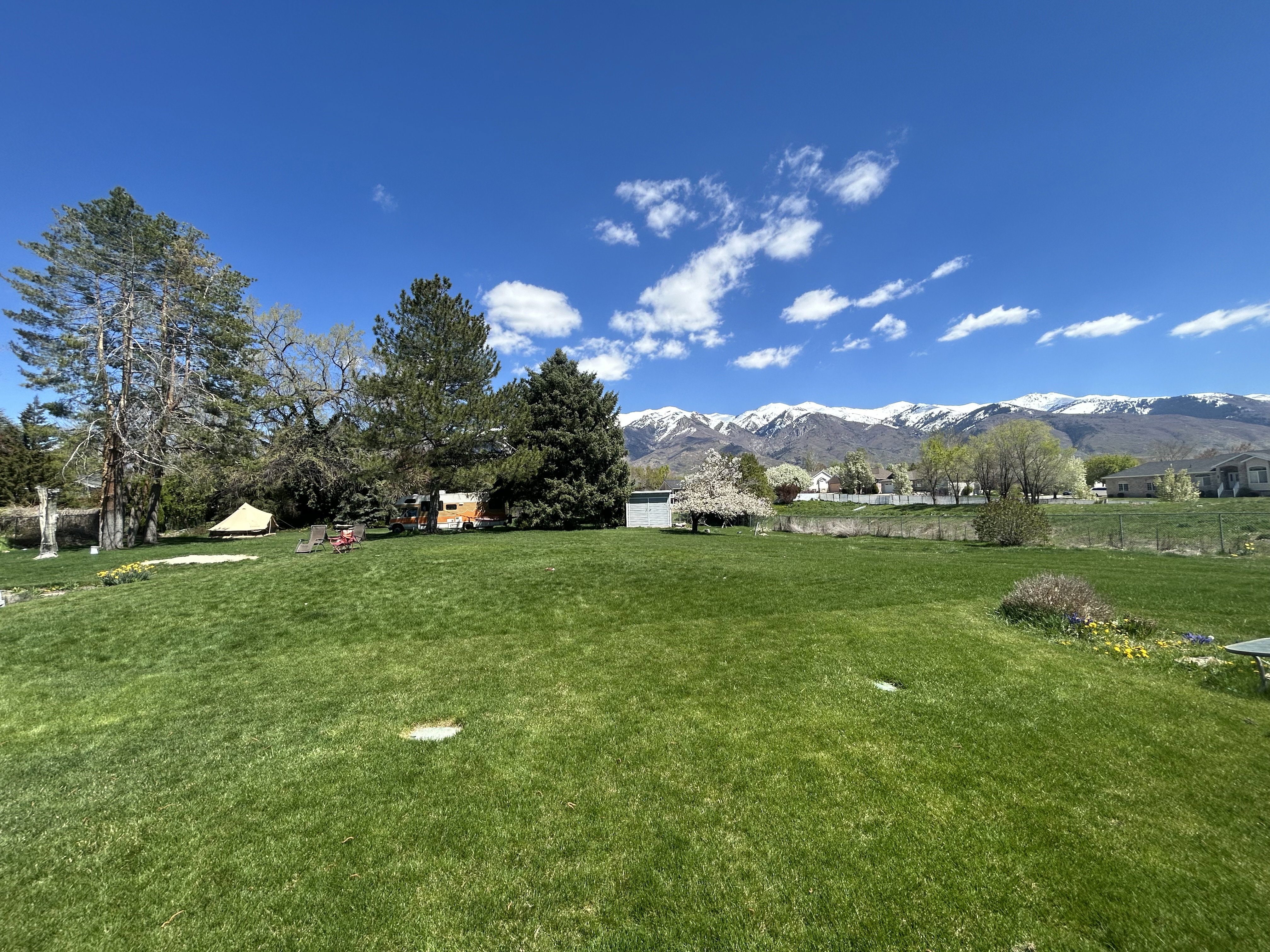View of green lawn with a mountain view