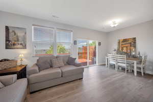 Living area with light wood-type flooring