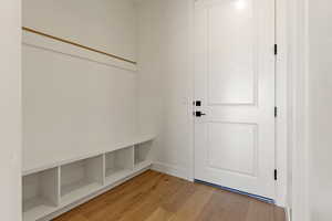 Mudroom with light wood-type flooring