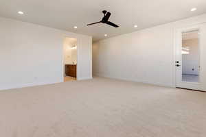 Empty room with recessed lighting, baseboards, light colored carpet, and ceiling fan