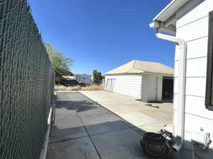View of patio / terrace with an outbuilding