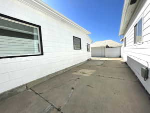 View of side of home featuring a garage