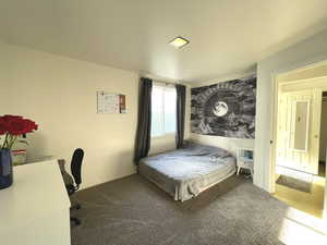 Bedroom featuring carpet flooring