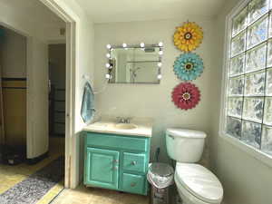 Bathroom with vanity and toilet