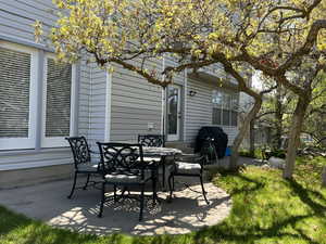 View of patio with outdoor dining space