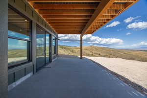 View of patio / terrace with a mountain view