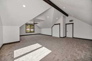 Bonus room with light colored carpet and recessed lighting