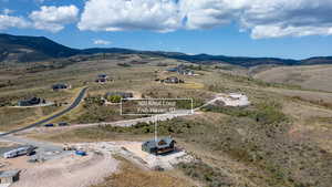 Overview of rural landscape featuring mountains and property boundaries highlighted