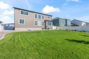 Back of property with stucco siding and crawl space