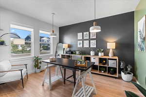 Home office featuring light wood finished floors