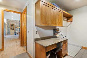 Home office featuring baseboards, recessed lighting, and light tile patterned floors