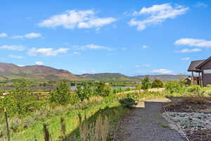 Mountain view featuring a large body of water