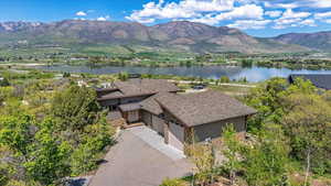 View from above of property featuring a water and mountain view