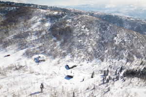 Snowy aerial view with a mountain view