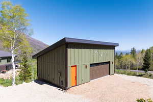 Detached garage with a mountain view