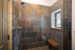 Bathroom with a tile shower