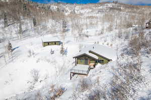 Snowy aerial view with a mountain view