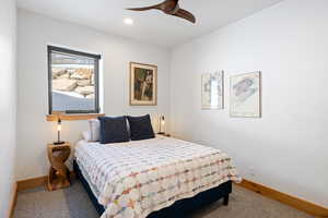 Bedroom with carpet, baseboards, recessed lighting, and ceiling fan