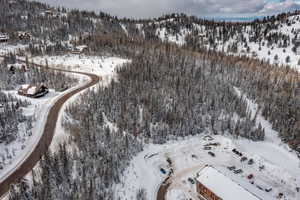 Snowy aerial view with a mountain view