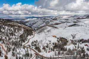 Snowy aerial view with a mountain view
