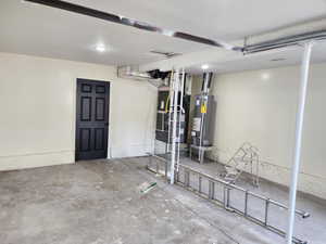 Below grade area featuring gas water heater