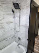 Bathroom featuring bathtub / shower combination