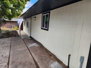 View of side of property featuring a patio