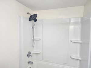 Full bathroom featuring bathtub / shower combination