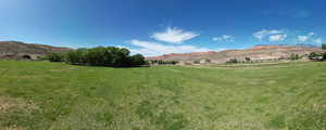 View of mountain backdrop with rural landscape