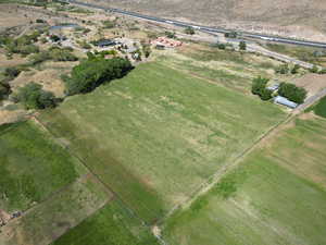 Aerial view of property and surrounding area with rural landscape