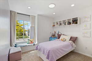 Bedroom featuring carpet floors, recessed lighting, and baseboards