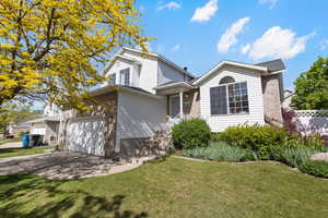 View of front of property featuring brick siding