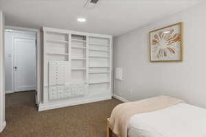 Bedroom featuring carpet floors, baseboards, and recessed lighting
