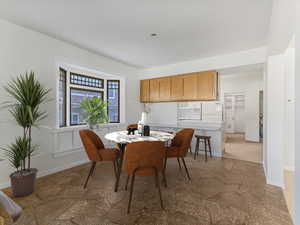 Dining area with baseboards