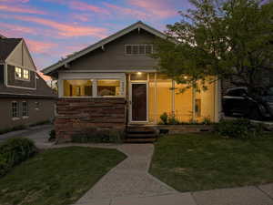 View of front of property with a front lawn