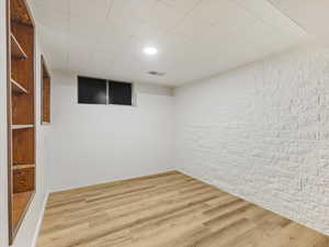 Finished below grade area featuring wood finished floors