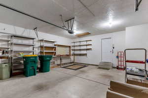 Large 2 Car Garage with Storage. Also, Extra Storage in the Crawl Space.