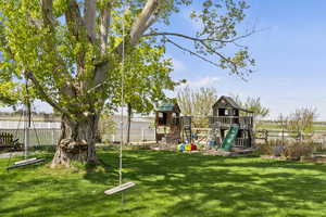 View of yard featuring a playground