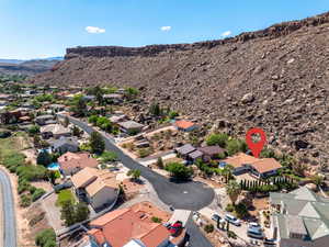 Aerial view of residential area with a mountainous background