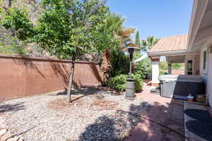 View of patio featuring a hot tub