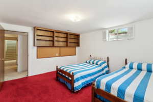 Bedroom featuring carpet floors