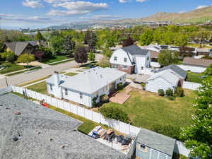 Aerial view of residential area featuring mountains