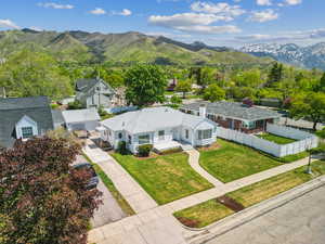 Aerial view of residential area featuring a mountain backdrop